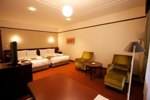 Imagen de la habitación del Hotel Mampei. Foto 7