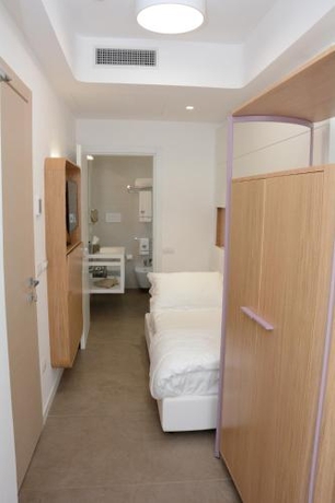 Imagen de la habitación del Hotel M&f. Foto 8