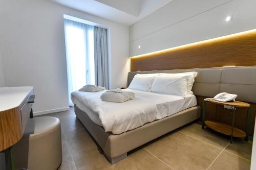 Imagen de la habitación del Hotel M&f. Foto 9