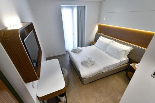 Imagen de la habitación del Hotel M&f. Foto 10