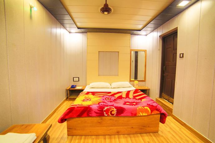 Imagen de la habitación del Hotel Mamta Palace. Foto 8