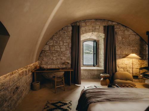 Imagen de la habitación del Hotel Mamula Island by Banyan Tree. Foto 15