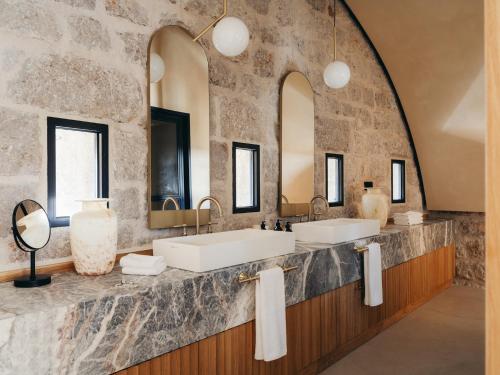 Imagen de la habitación del Hotel Mamula Island by Banyan Tree. Foto 19