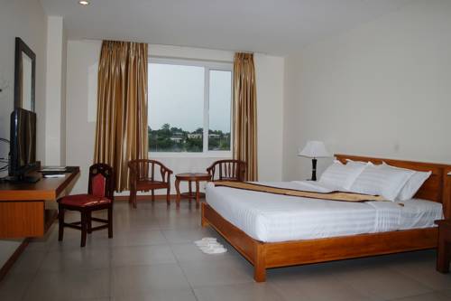 Imagen de la habitación del Hotel Man Myanmar. Foto 2