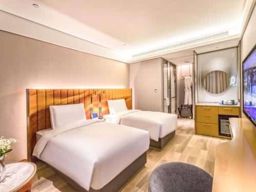 Imagen general del Hotel Man Xin Zhangjiagang Pedestrian Street. Foto 4