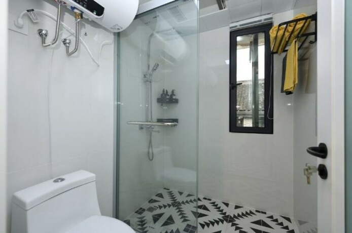 Imagen de la habitación del Hotel Man Yin Ju Modern Style Apartment. Foto 12