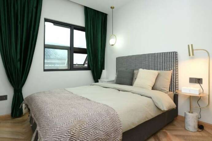 Imagen de la habitación del Hotel Man Yin Ju Modern Style Apartment. Foto 14