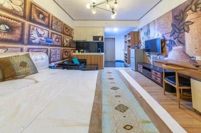 Imagen de la habitación del Hotel ManGo Holiday Internation Apartment. Foto 17