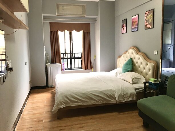 Imagen de la habitación del Hotel ManGo Holiday Internation Apartment. Foto 19