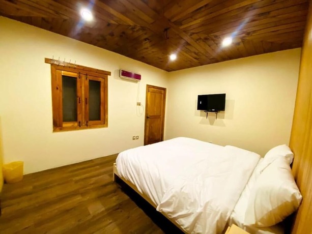 Imagen de la habitación del Hotel ManaSau Resort. Foto 14