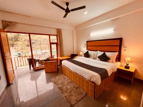 Imagen de la habitación del Hotel Manali Beas River Retreat. Foto 20