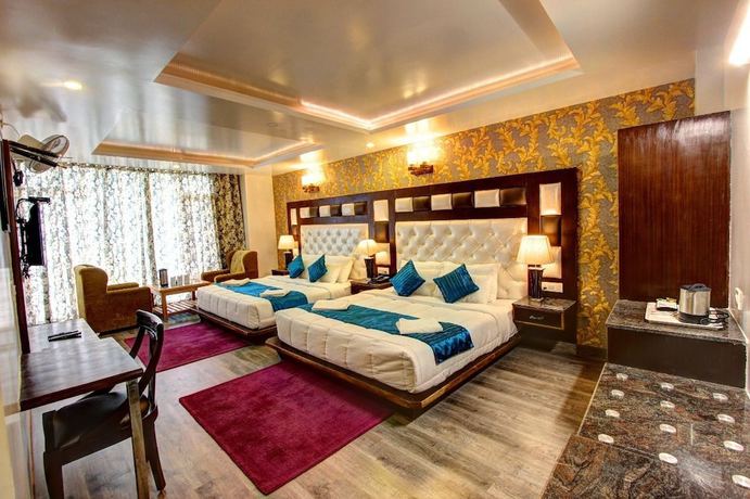 Imagen de la habitación del Hotel Manali Grand. Foto 4
