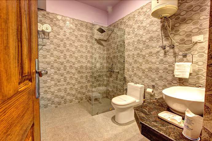 Imagen de la habitación del Hotel Manali Grand. Foto 12