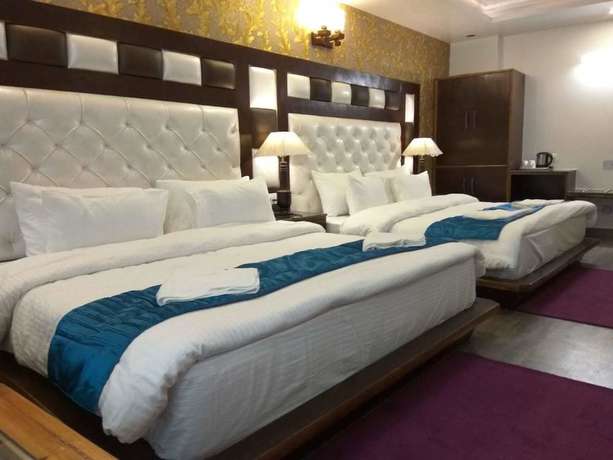 Imagen de la habitación del Hotel Manali Grand. Foto 14