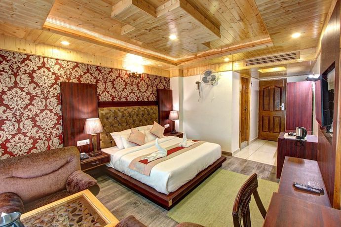 Imagen de la habitación del Hotel Manali Grand. Foto 16
