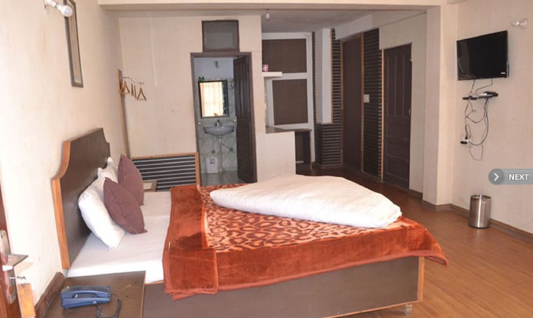Imagen de la habitación del Hotel Manali Jain Cottage. Foto 9