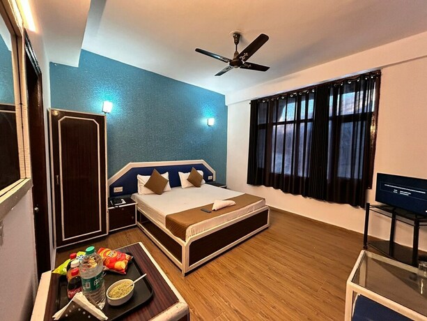 Imagen de la habitación del Hotel Manali Palace. Foto 19