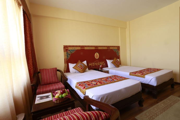 Imagen de la habitación del Hotel Manang. Foto 10