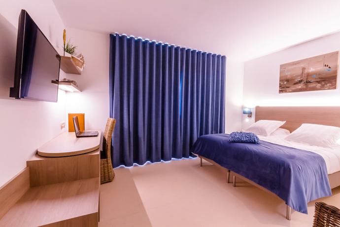 Imagen de la habitación del Hotel Manava. Foto 11