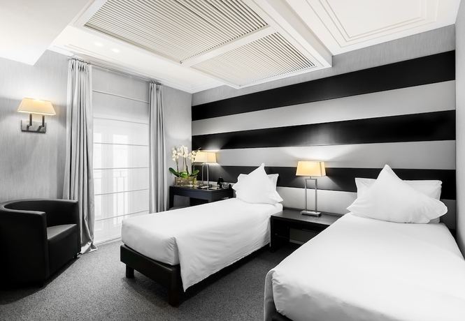 Imagen de la habitación del Hotel Mancino 12. Foto 13