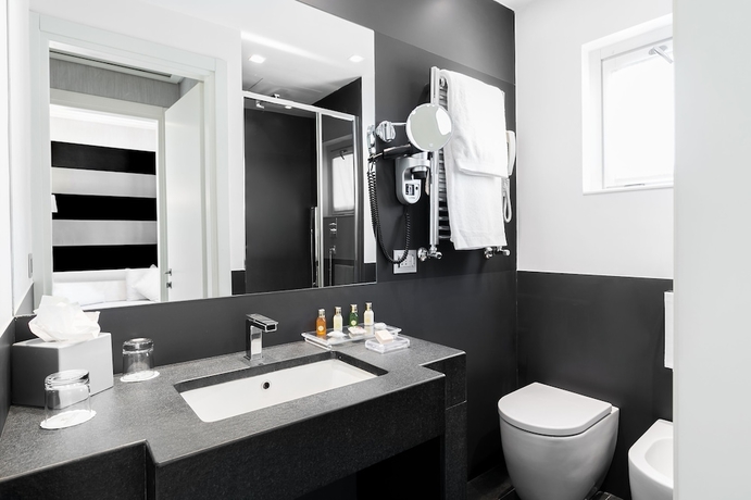 Imagen de la habitación del Hotel Mancino 12. Foto 18