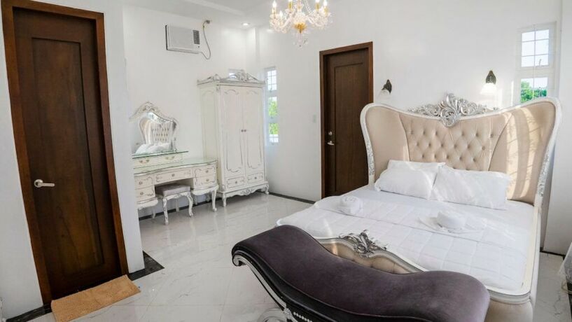 Imagen de la habitación del Hotel Mancion Bakasyunan Resort San Pablo. Foto 16