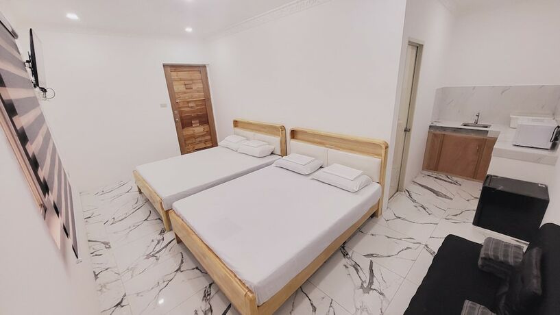 Imagen de la habitación del Hotel Mancion Bakasyunan Resort San Pablo. Foto 19