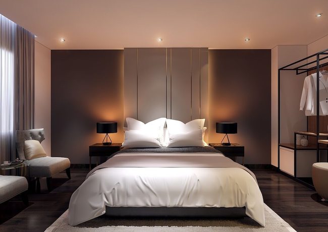 Imagen de la habitación del Hotel MandH. Foto 10