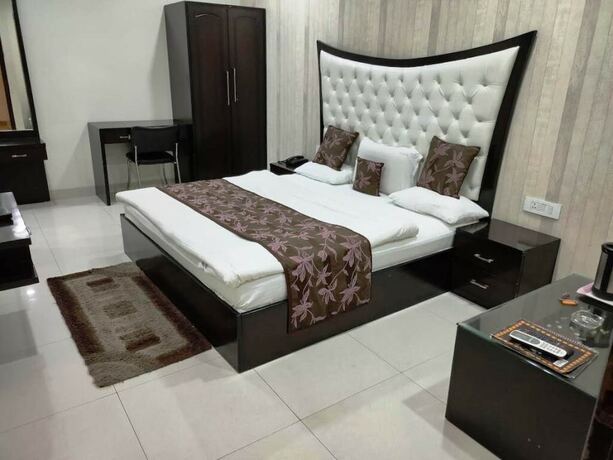 Imagen de la habitación del Hotel Mandakini Lush. Foto 15
