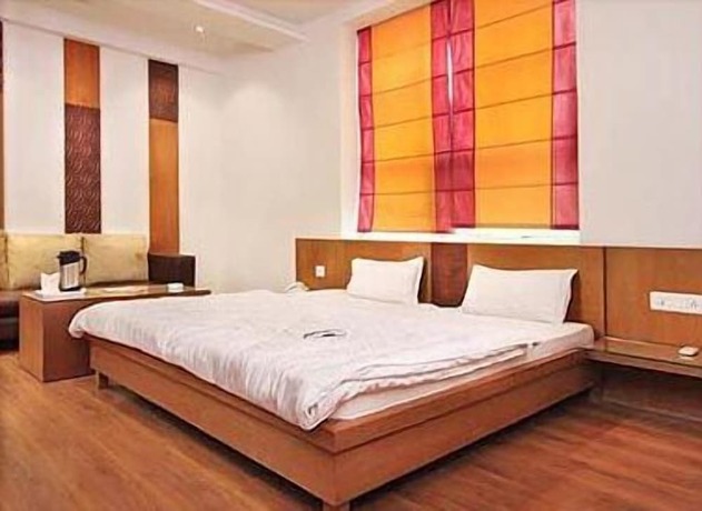 Imagen de la habitación del Hotel Mandakini Plaza, Kanpur. Foto 6