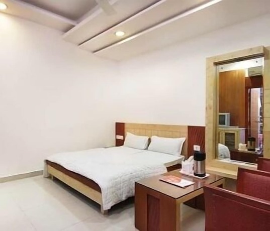 Imagen de la habitación del Hotel Mandakini Plaza, Kanpur. Foto 7