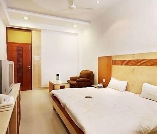 Imagen de la habitación del Hotel Mandakini Plaza, Kanpur. Foto 8