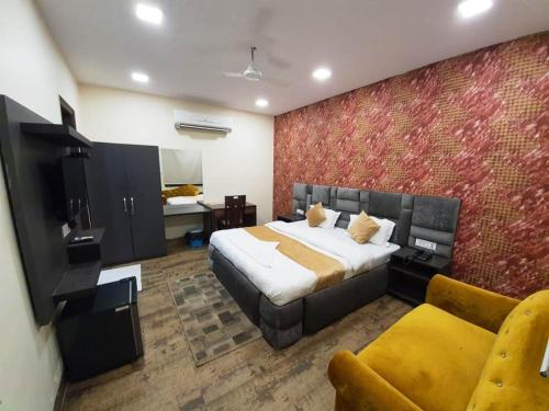 Imagen de la habitación del Hotel Mandakini Royale. Foto 19