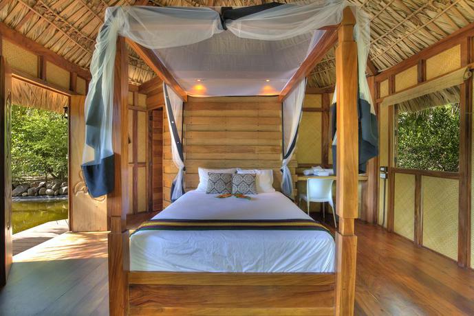 Imagen de la habitación del Hotel Mandala Eco Villas. Foto 4