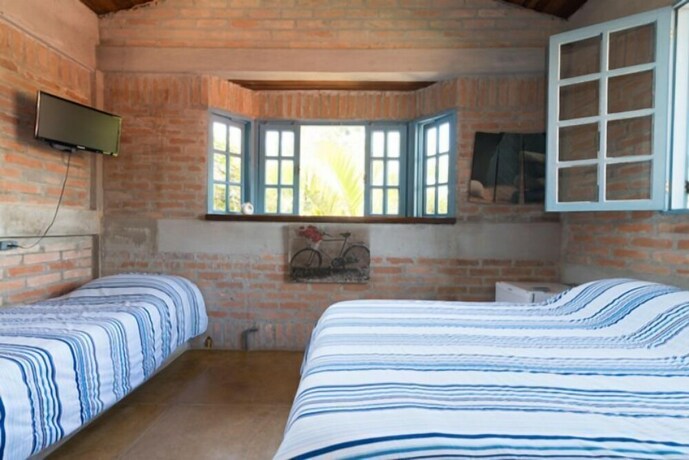 Imagen de la habitación del Hotel Mandala Maresias. Foto 17
