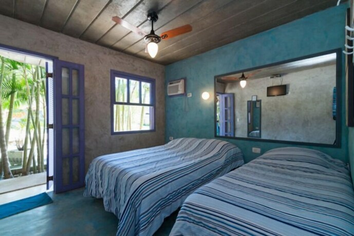 Imagen de la habitación del Hotel Mandala Maresias. Foto 29