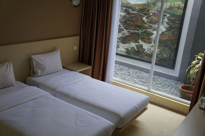 Imagen de la habitación del Hotel Mandala, Mekarsari. Foto 8