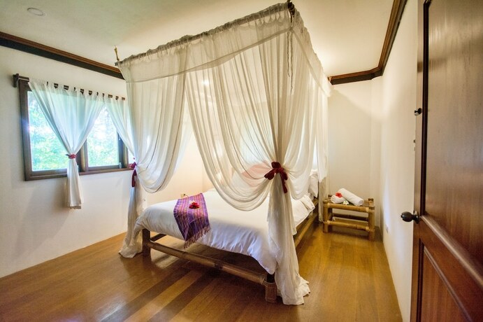 Imagen de la habitación del Hotel Mandala Spa and Resort Villas. Foto 35