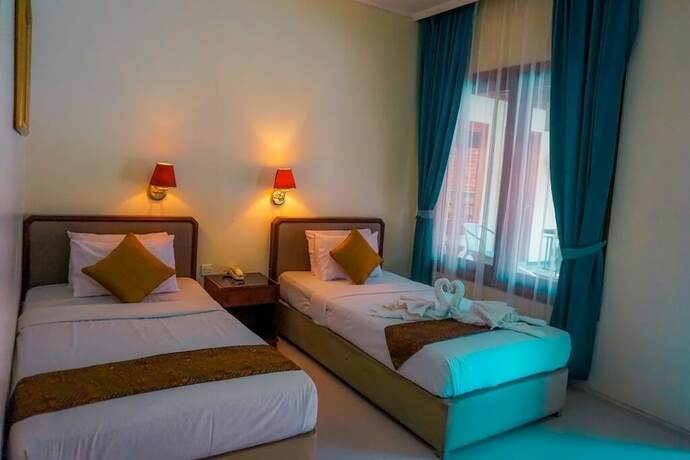 Imagen de la habitación del Hotel Mandala Wisata. Foto 20