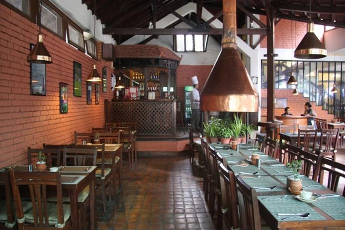 Imagen del bar/restaurante del Hotel Mandap. Foto 6