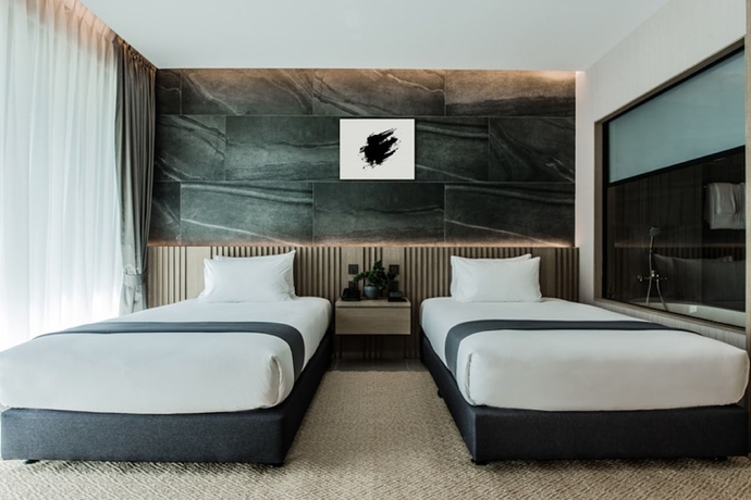 Imagen de la habitación del Hotel Mandarin Eastville, Pattaya. Foto 11