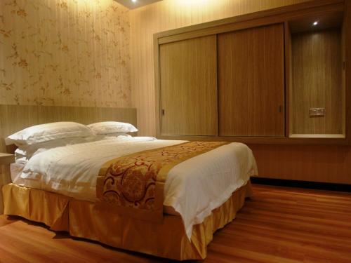 Imagen de la habitación del Hotel Mandarin Kota Kinabalu. Foto 7