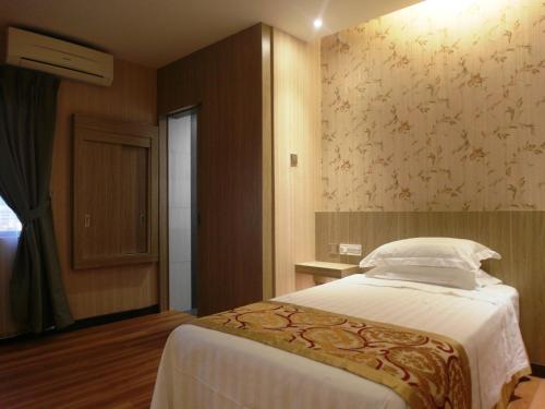 Imagen de la habitación del Hotel Mandarin Kota Kinabalu. Foto 8