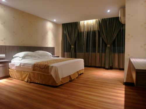 Imagen de la habitación del Hotel Mandarin Kota Kinabalu. Foto 9