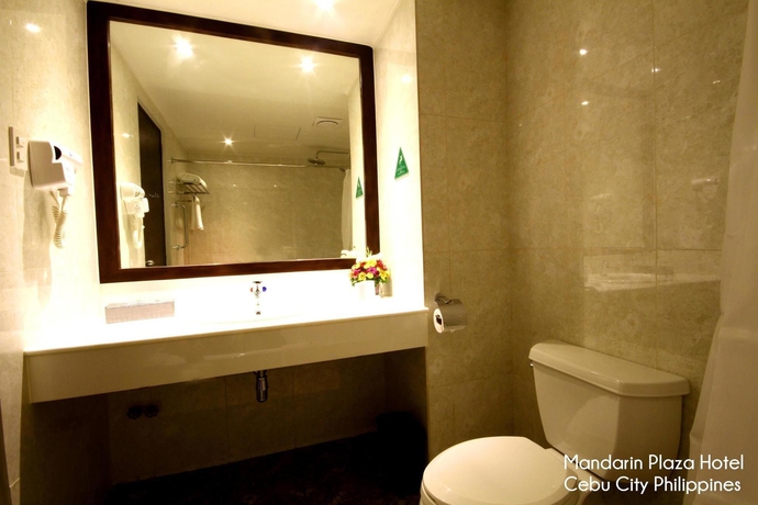 Imagen de la habitación del Hotel Mandarin Plaza. Foto 3