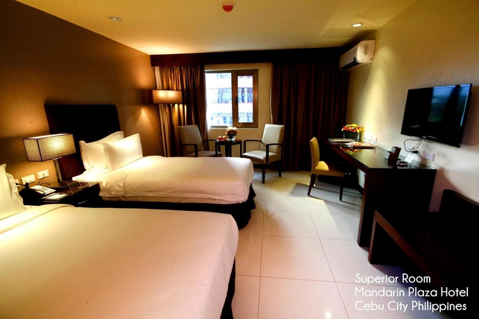 Imagen de la habitación del Hotel Mandarin Plaza. Foto 6