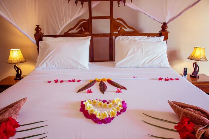 Imagen de la habitación del Hotel Mandarin Resort Zanzibar. Foto 18