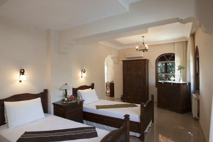 Imagen de la habitación del Hotel Mandarin and Mango Boutique. Foto 24