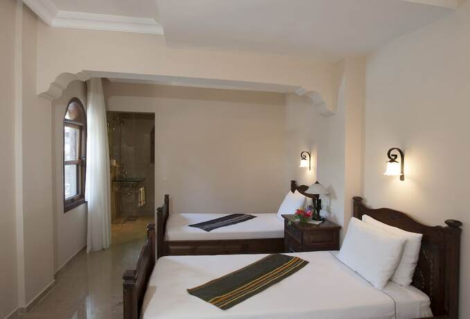 Imagen de la habitación del Hotel Mandarin and Mango Boutique. Foto 27