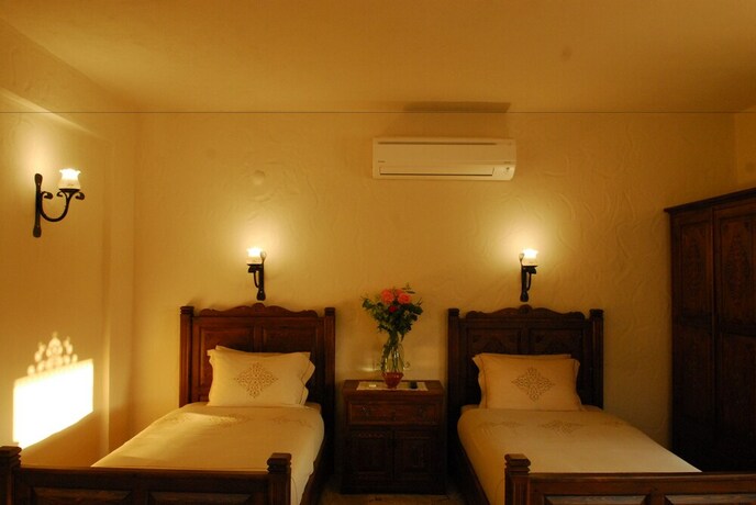 Imagen de la habitación del Hotel Mandarin and Mango Boutique. Foto 32